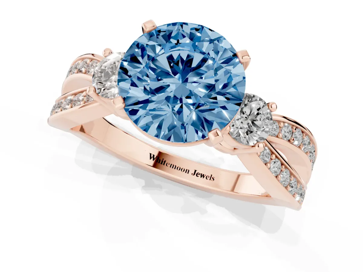 Fancy Blue Three-Stone Round Cut Cut Diamond Twist Band with Prong Setting Rose gold