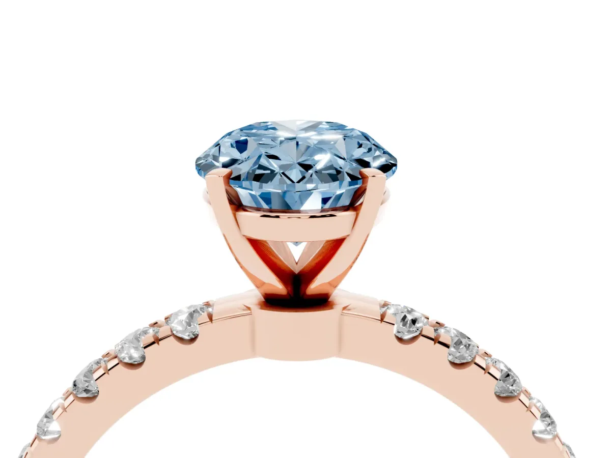 Fancy Blue Oval Cut Diamond Solitaire Ring with Pavé Accents and Four-Prong Setting Rose gold