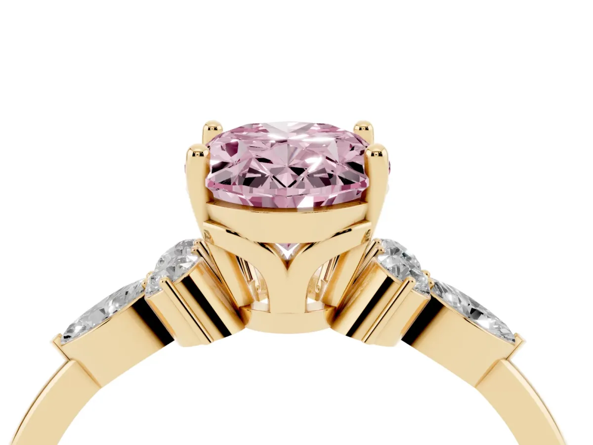 Fancy Pink Oval Cut Brilliant Diamond Solitaire Ring with Pear Side Stones and Four-Prong Setting Yellow gold