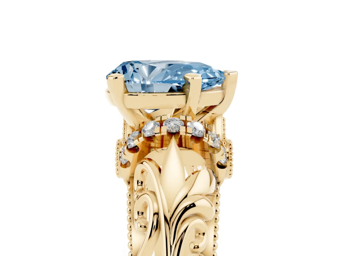 Fancy Blue Pear Cut Solitaire Filigree Engagement Ring with Halo and Prong Setting Yellow gold