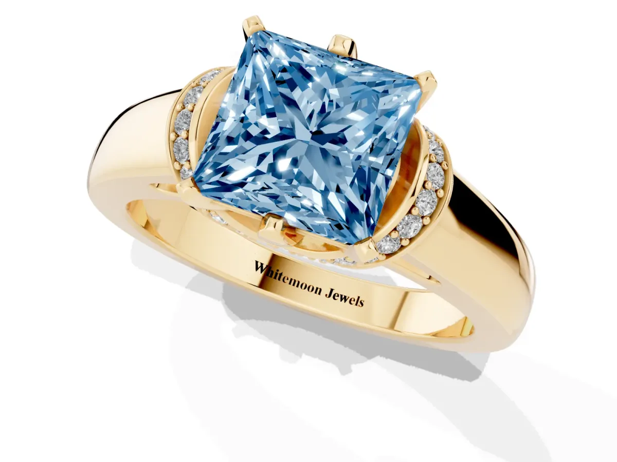 Fancy Blue Princess Cut Solitaire Diamond Ring with Pave Band and Six-Prong Setting Yellow gold