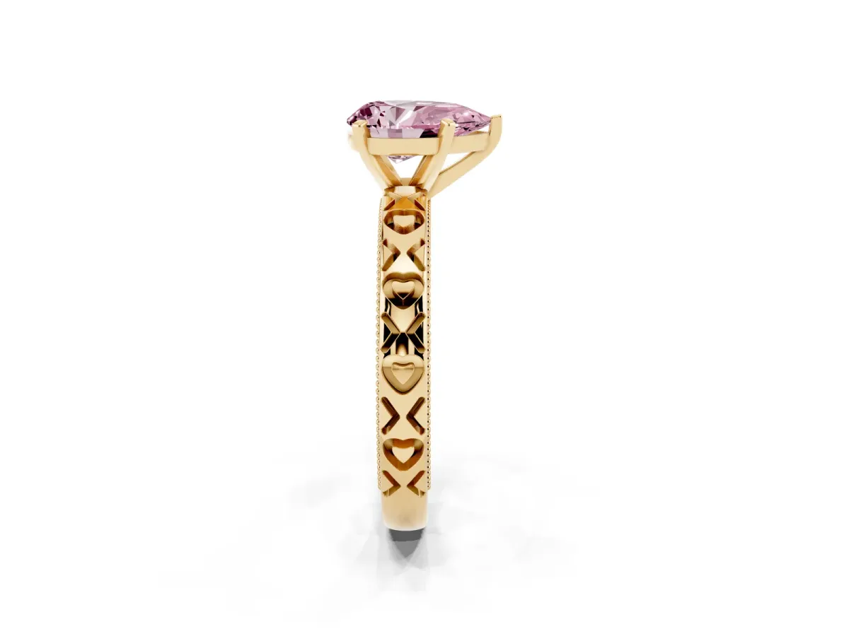 Fancy Pink Pear Cut Solitaire Diamond Engagement Ring with XO Engraved Band and Four-Prong Setting Yellow gold