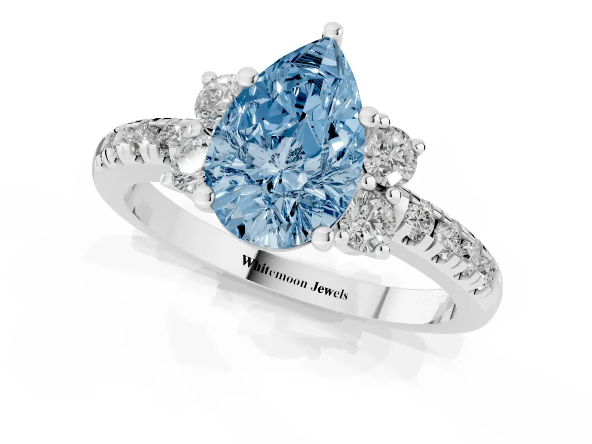 Fancy Blue Pear Cut Diamond Three-Stone Pave Band with Four-Prong Setting Platinum