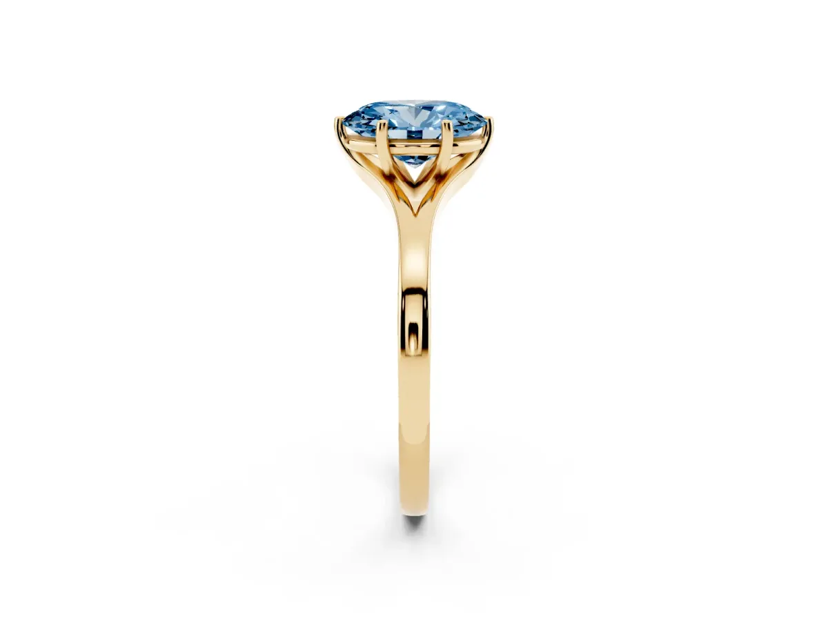 Fancy Blue Oval Cut Solitaire Diamond Ring with Six-Prong Setting and Tapered Band Yellow gold