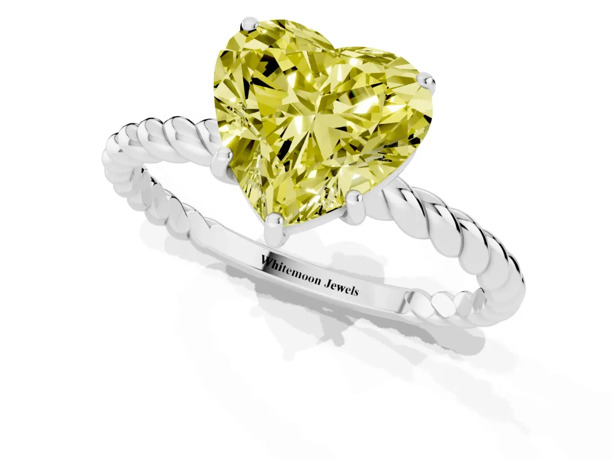 Fancy Yellow Heart Cut Solitaire Twist Band Ring with Four-Prong Setting Silver