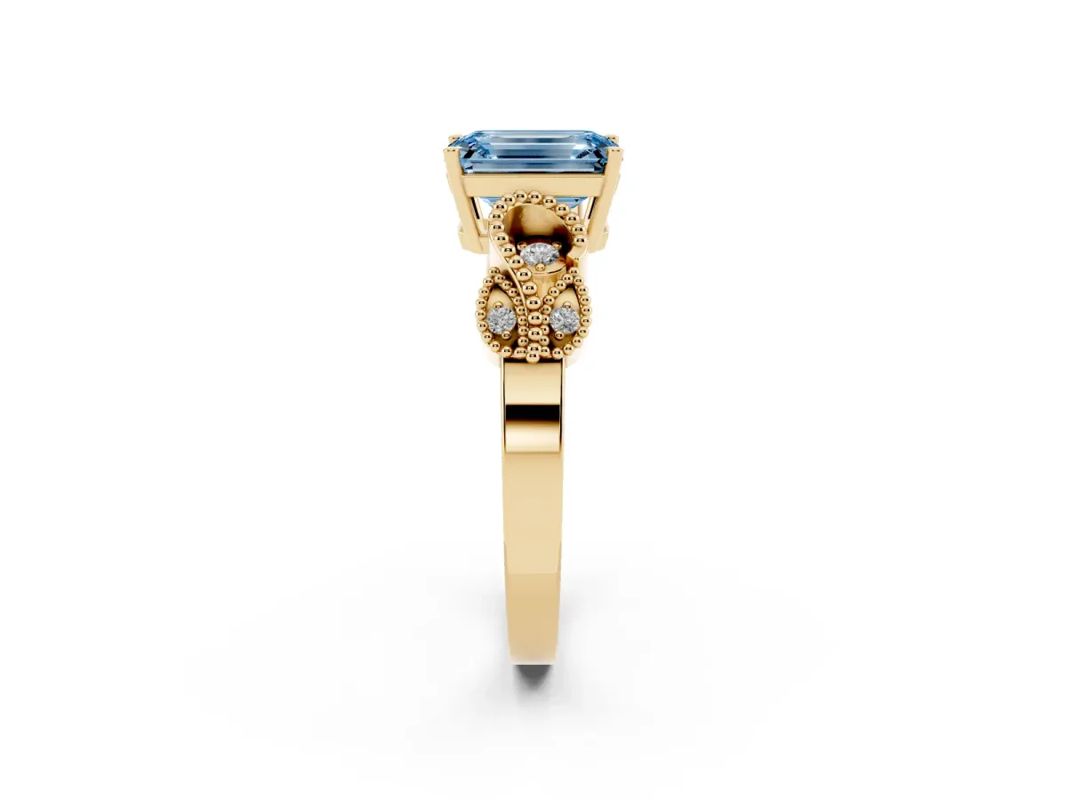 Fancy Blue Emerald Cut Solitaire Milgrain Leaf Band with Prong Setting Yellow gold