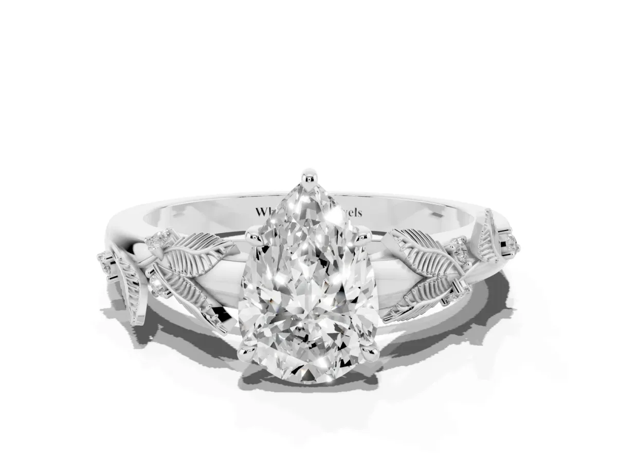 Pear Cut Diamond Solitaire Ring with Leaf Motif Band and Four-Prong Setting Silver