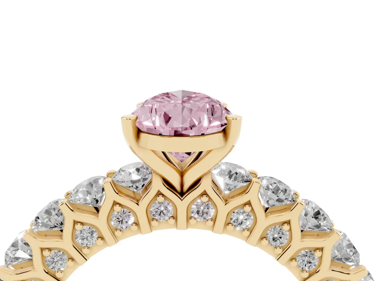 Fancy Pink Pear Cut Diamond Solitaire Ring with Shared Prong Pavé Band and Four-Prong Setting Yellow gold