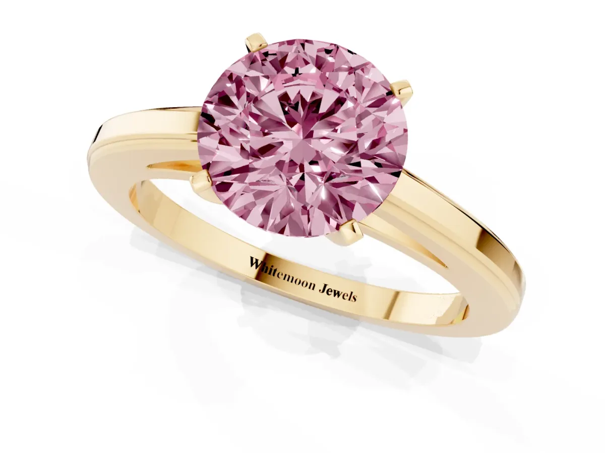 Fancy Pink Round Cut Solitaire Diamond Ring with Four-Prong Setting and Classic Band Yellow gold