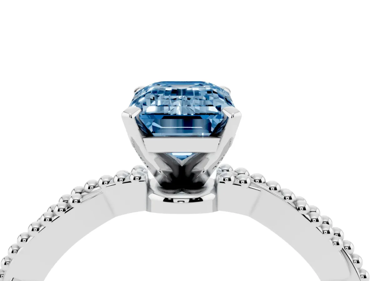 Fancy Blue Emerald Cut Solitaire Twisted Band with Bead Prong Setting Silver