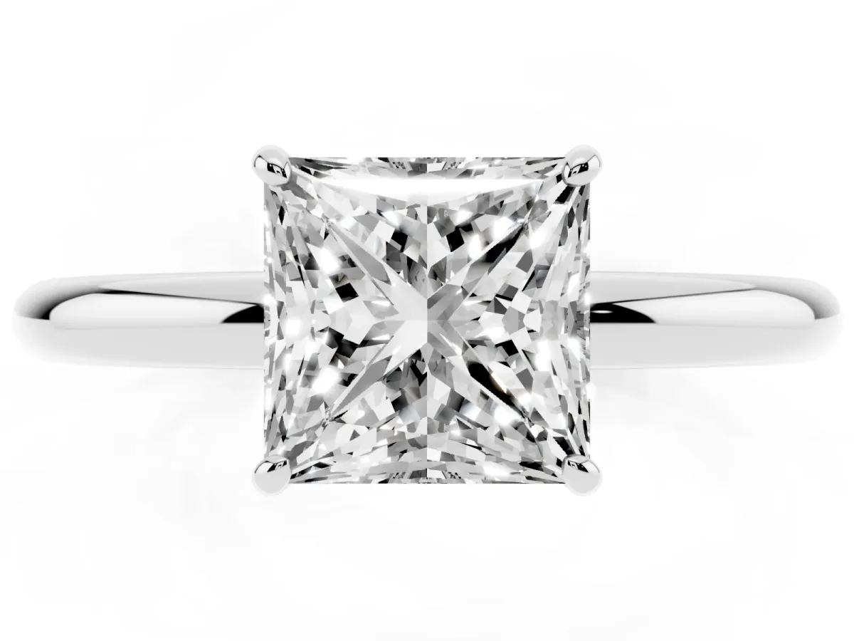 Princess Cut Solitaire Diamond Ring with Four-Prong Setting on a Plain Band Platinum