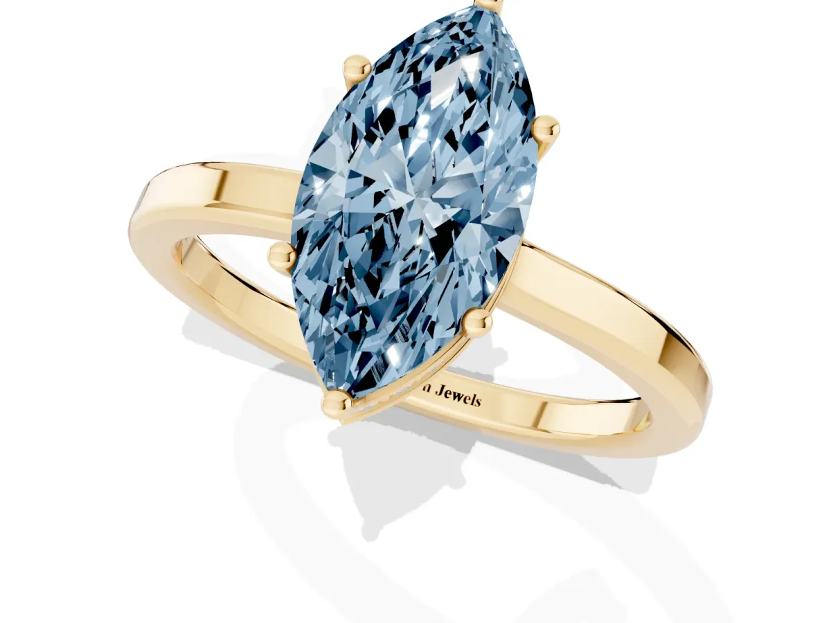 Fancy Blue Marquise Cut Cut Solitaire Engagement Ring with Four-Prong Setting on a Classic Band Yellow gold