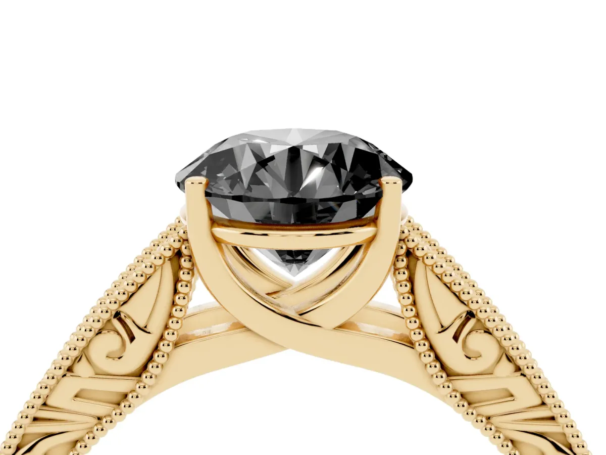 Fancy Black Round Cut Diamond Solitaire Ring with Engraved Band and Four-Prong Setting Yellow gold