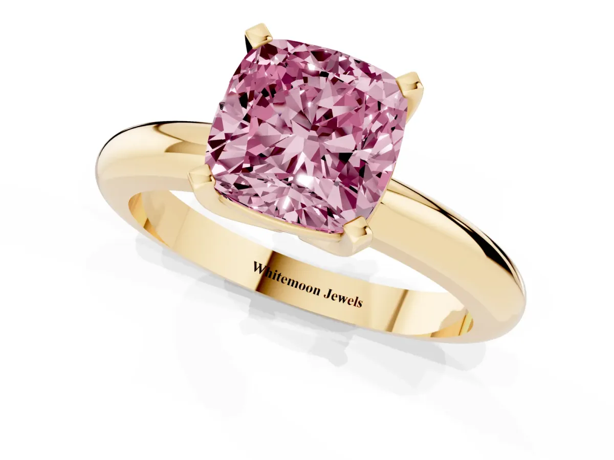 Fancy Pink Cushion Cut Diamond Solitaire Engagement Ring with Round Band and Four-Prong Setting Yellow gold