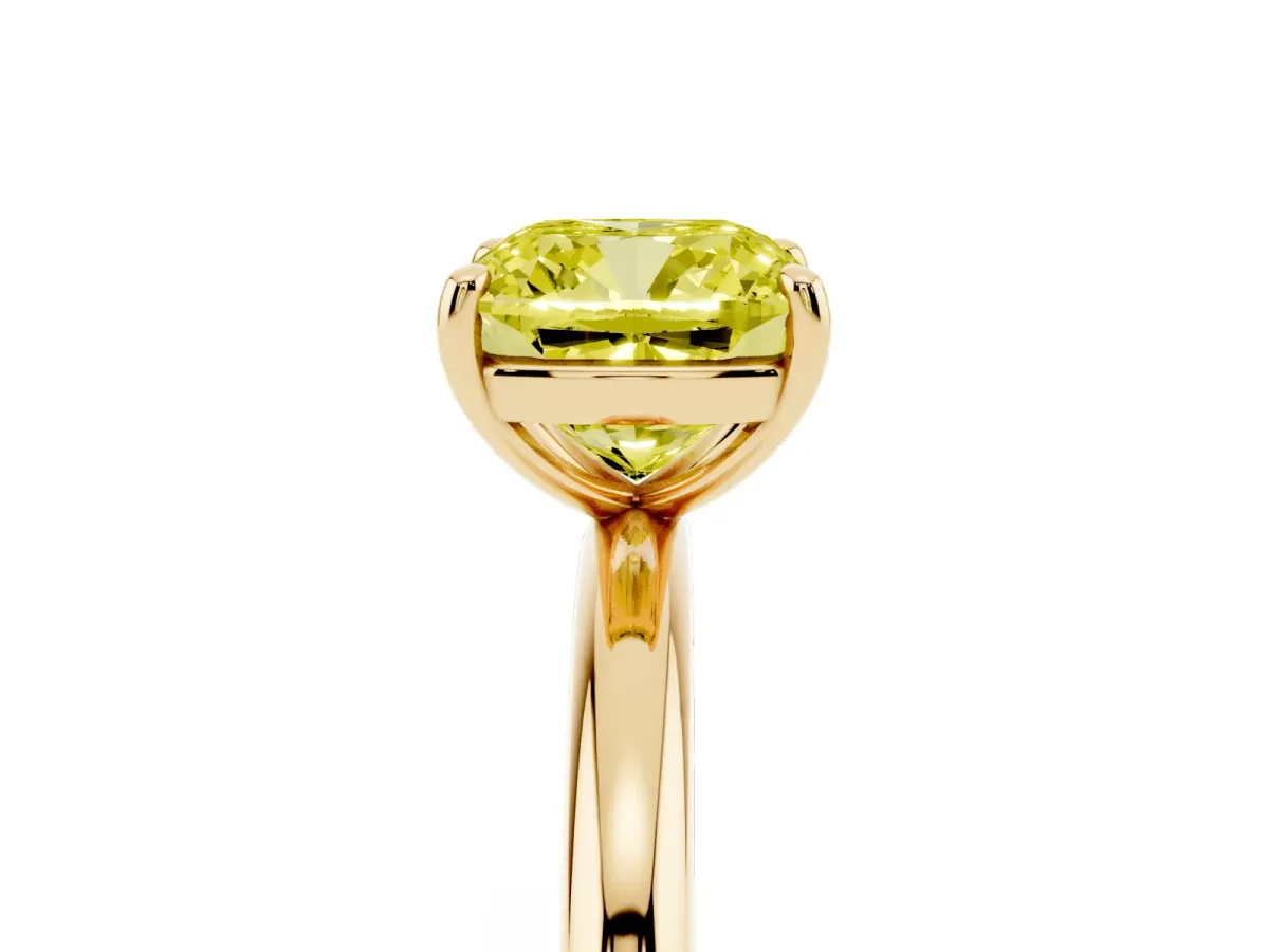 Fancy Yellow Cushion Cut Solitaire Diamond Ring with Four-Prong Setting on a Plain Band Yellow gold