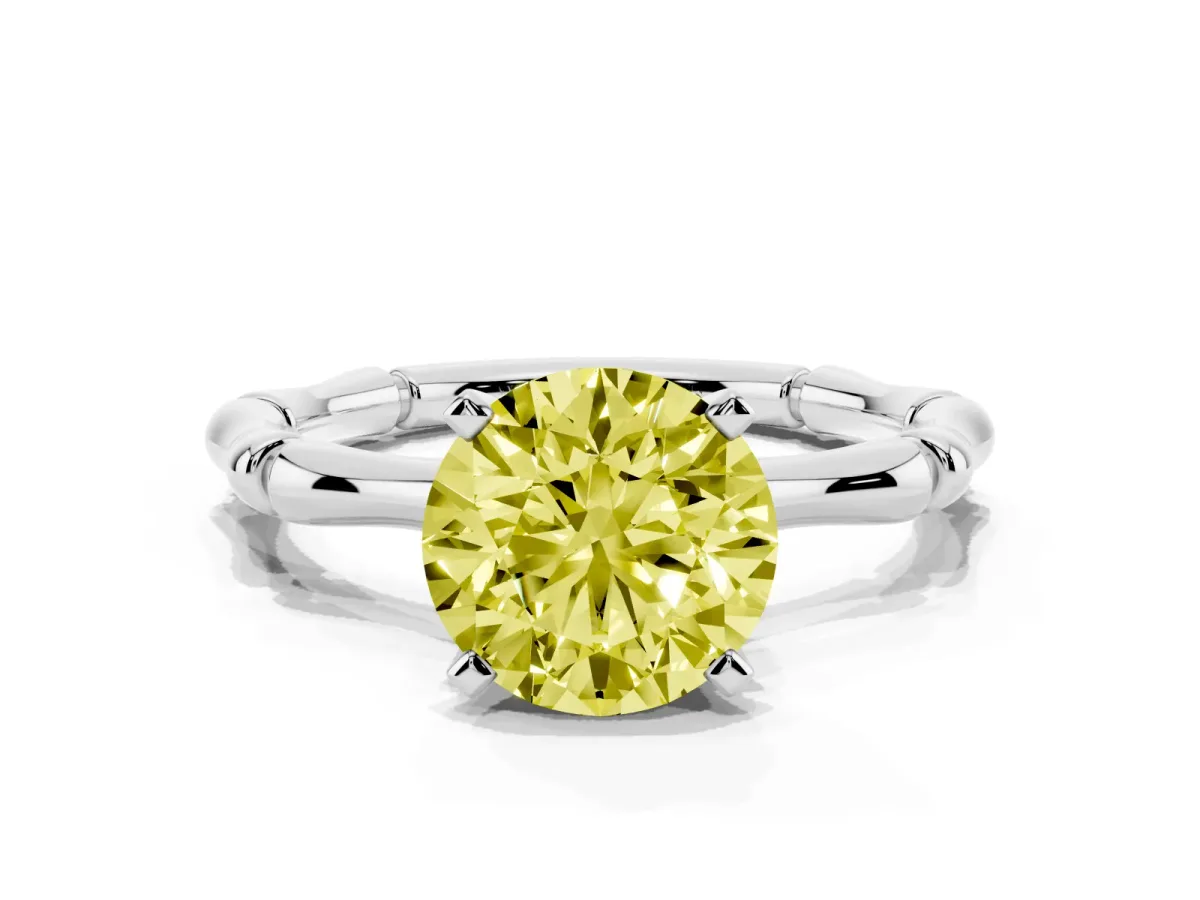Fancy Yellow Round Cut Solitaire Diamond Ring with Bamboo Band and Four-Prong Setting Silver