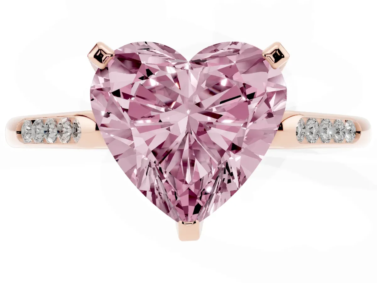Fancy Pink Heart Cut Diamond Solitaire Ring with Channel Set Round Band and Prong Setting Rose gold