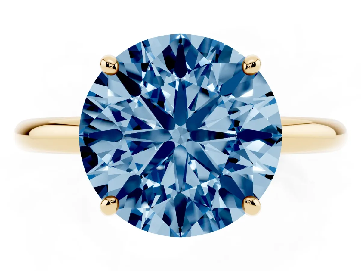 Fancy Blue Round Cut Solitaire Diamond Ring with Four-Prong Setting on a Plain Band Yellow gold