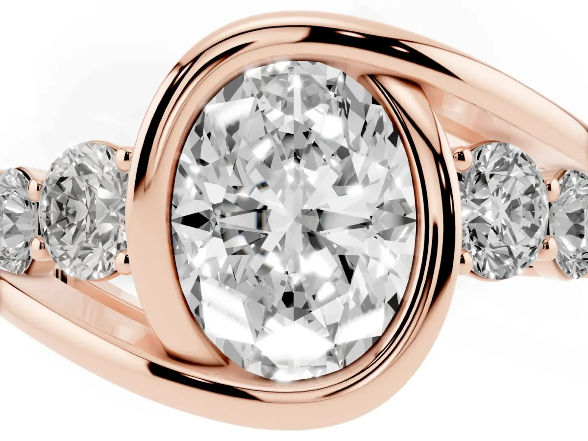 Bezel Set Oval Cut Diamond Bypass Ring with Round Accents Rose gold