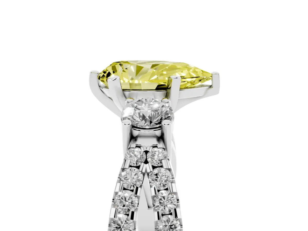 Fancy Yellow Pear Cut Diamond Three-Stone Ring with Pavé Split Shank and Four-Prong Setting Silver