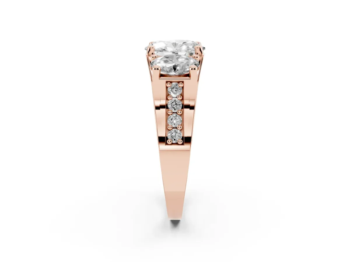 Oval Cut Diamond Three-Stone Ring with Channel Set Band and Four-Prong Setting Rose gold