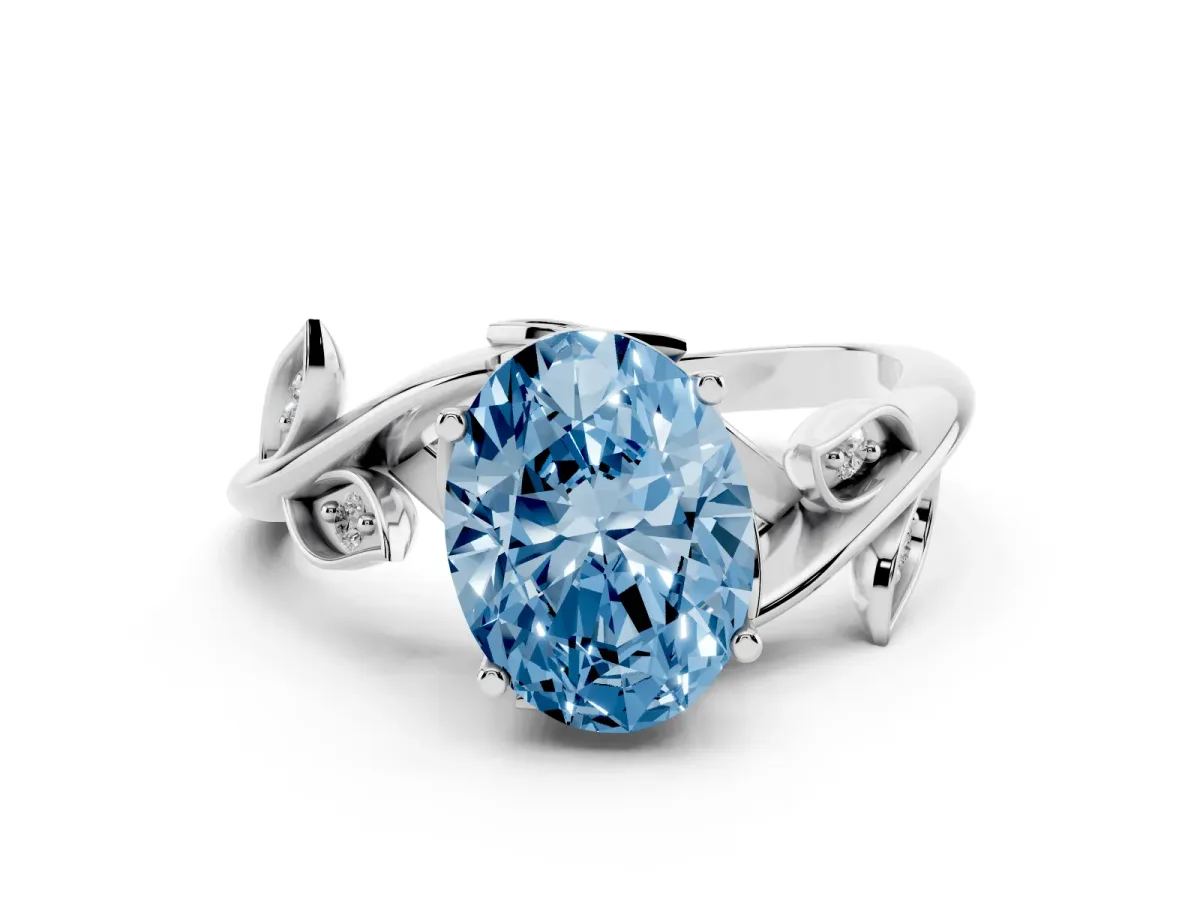 Fancy Blue Oval Cut Solitaire Twist Engagement Ring with Leaf Accents and Prong Setting Silver