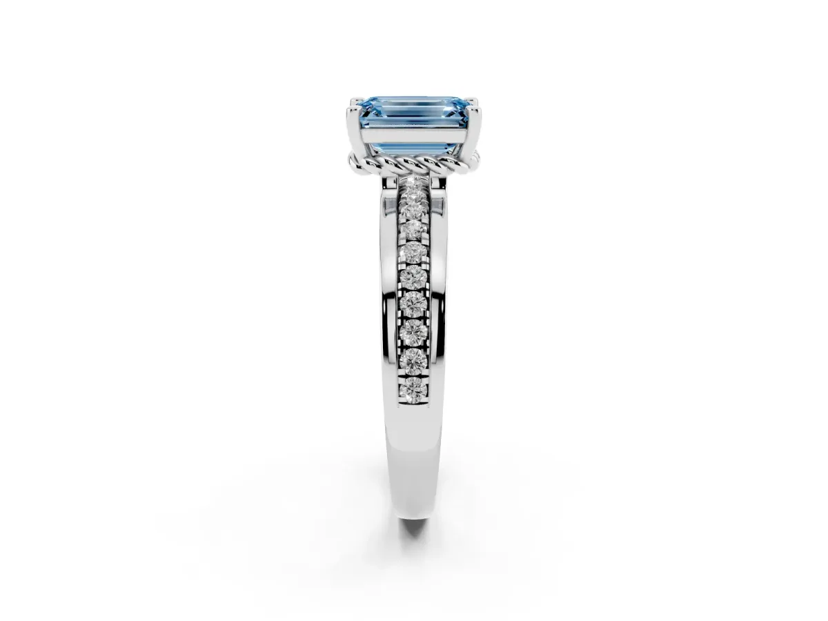 Fancy Blue Emerald Cut Solitaire Diamond Ring with Channel Set Band and Six-Prong Setting Silver