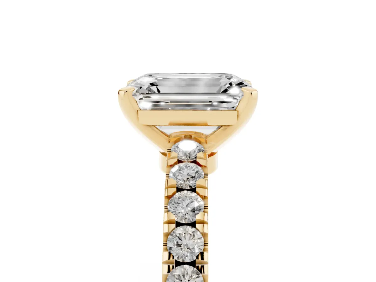 Emerald Cut Solitaire Diamond with Pavé Band and Four-Prong Setting Yellow gold