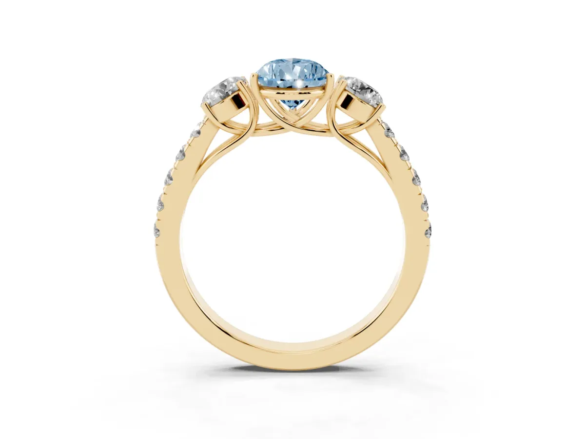 Fancy Blue Pear Cut Cut Diamond Three-Stone Ring with Round Side Stones and Pavé Band Yellow gold