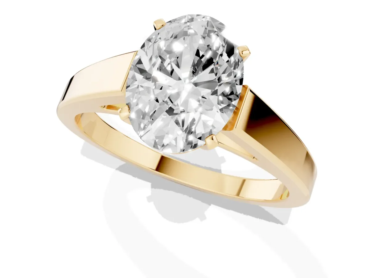 Oval Cut Solitaire Engagement Ring with Four-Prong Setting and Tapered Band Yellow gold