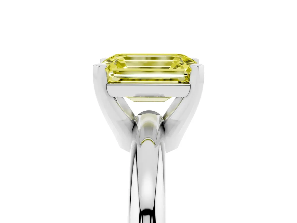 Fancy Yellow Emerald Cut Diamond Solitaire Engagement Ring with Round Band and Four-Prong Setting White gold