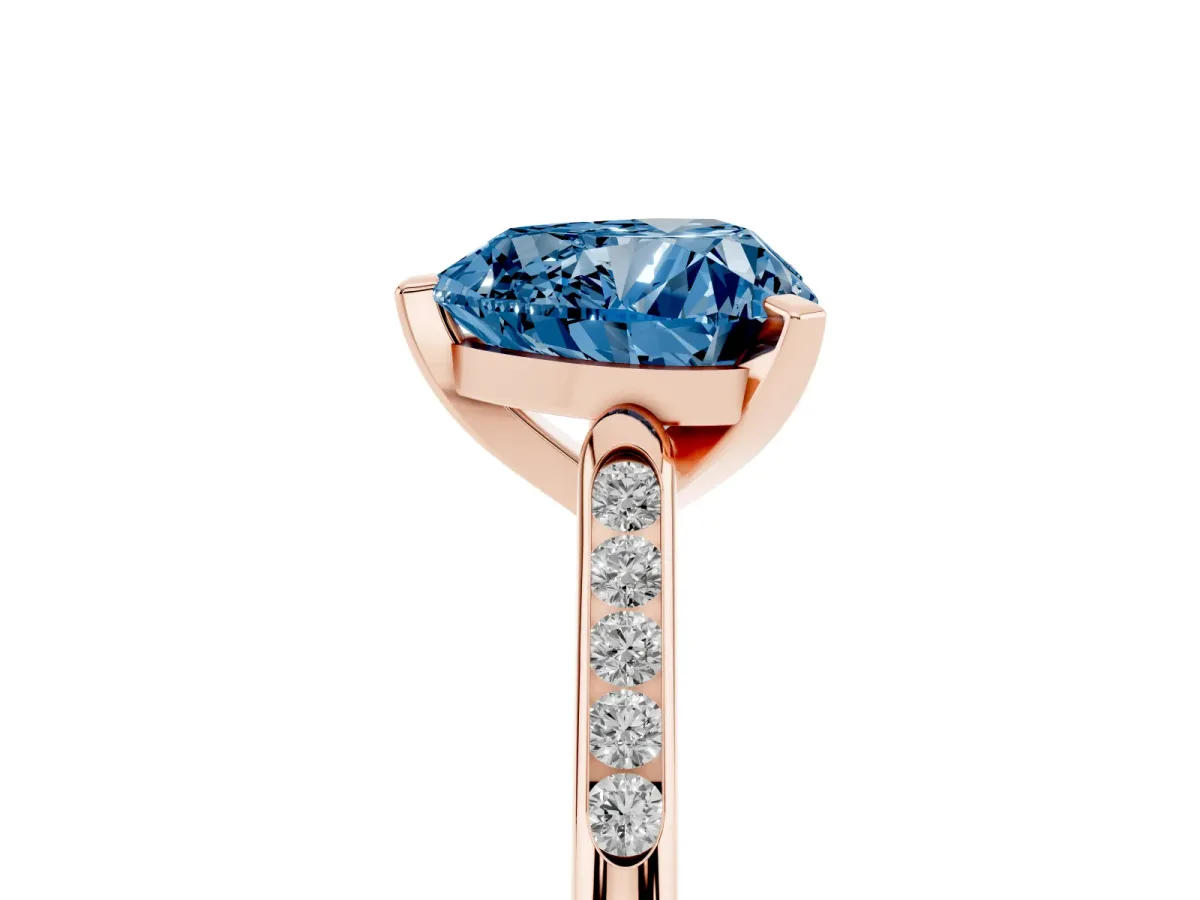 Fancy Blue Heart Cut Diamond Solitaire Ring with Channel Set Round Band and Prong Setting Rose gold