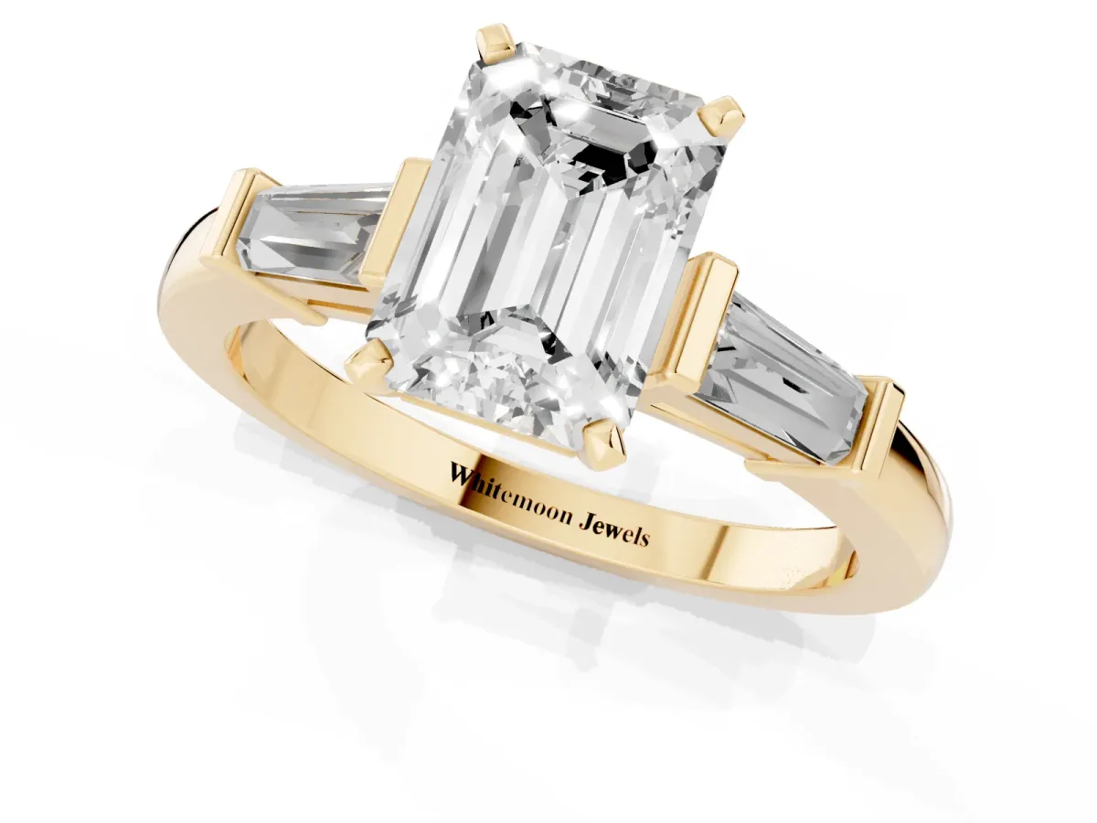 Emerald Cut Cut Diamond Solitaire Ring with Tapered Baguette Accents and Four-Prong Setting Yellow gold