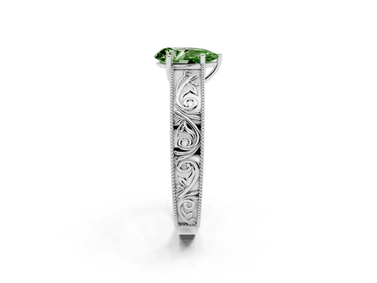 Fancy Green Pear Cut Diamond Solitaire Ring with Engraved Band and Four-Prong Setting Silver