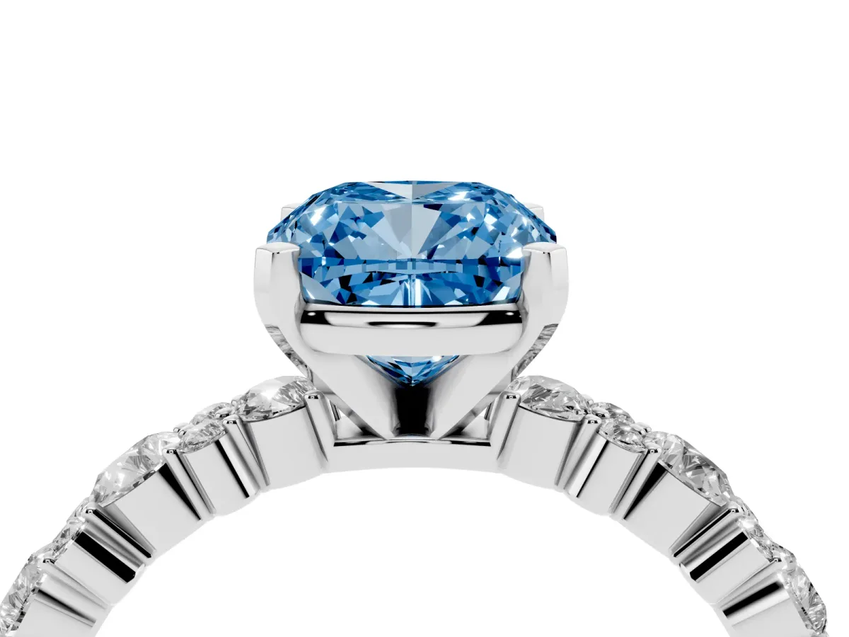 Fancy Blue Cushion Cut Diamond Side Stone Solitaire Ring with Round and Four-Prong Setting Platinum