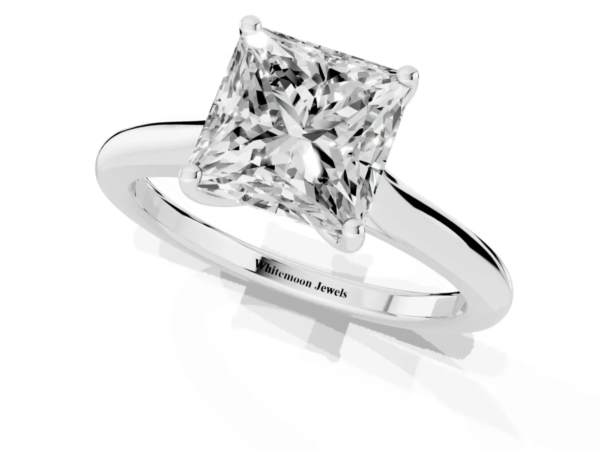 Princess Cut Cut Solitaire Ring with Cathedral Band and Four-Prong Setting Silver