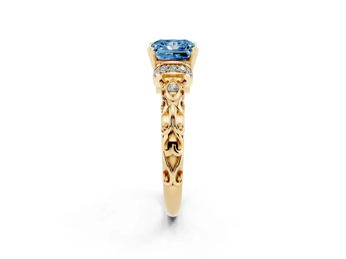 Fancy Blue Princess Cut Diamond Solitaire Ring with Filigree Band and Four-Prong Setting Yellow gold