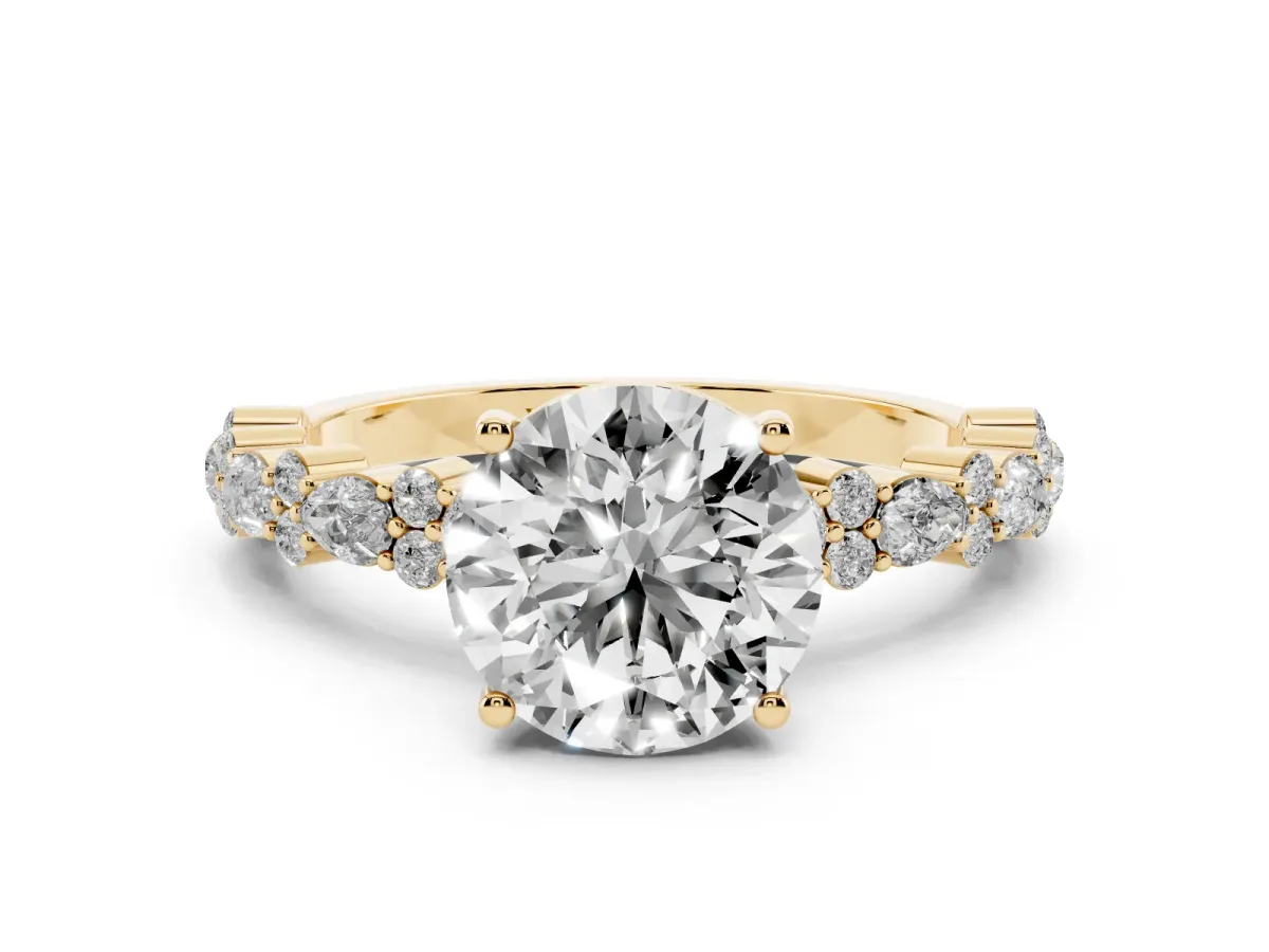 Round Cut Diamond Side Stone Solitaire Ring with Round and Four-Prong Setting Yellow gold