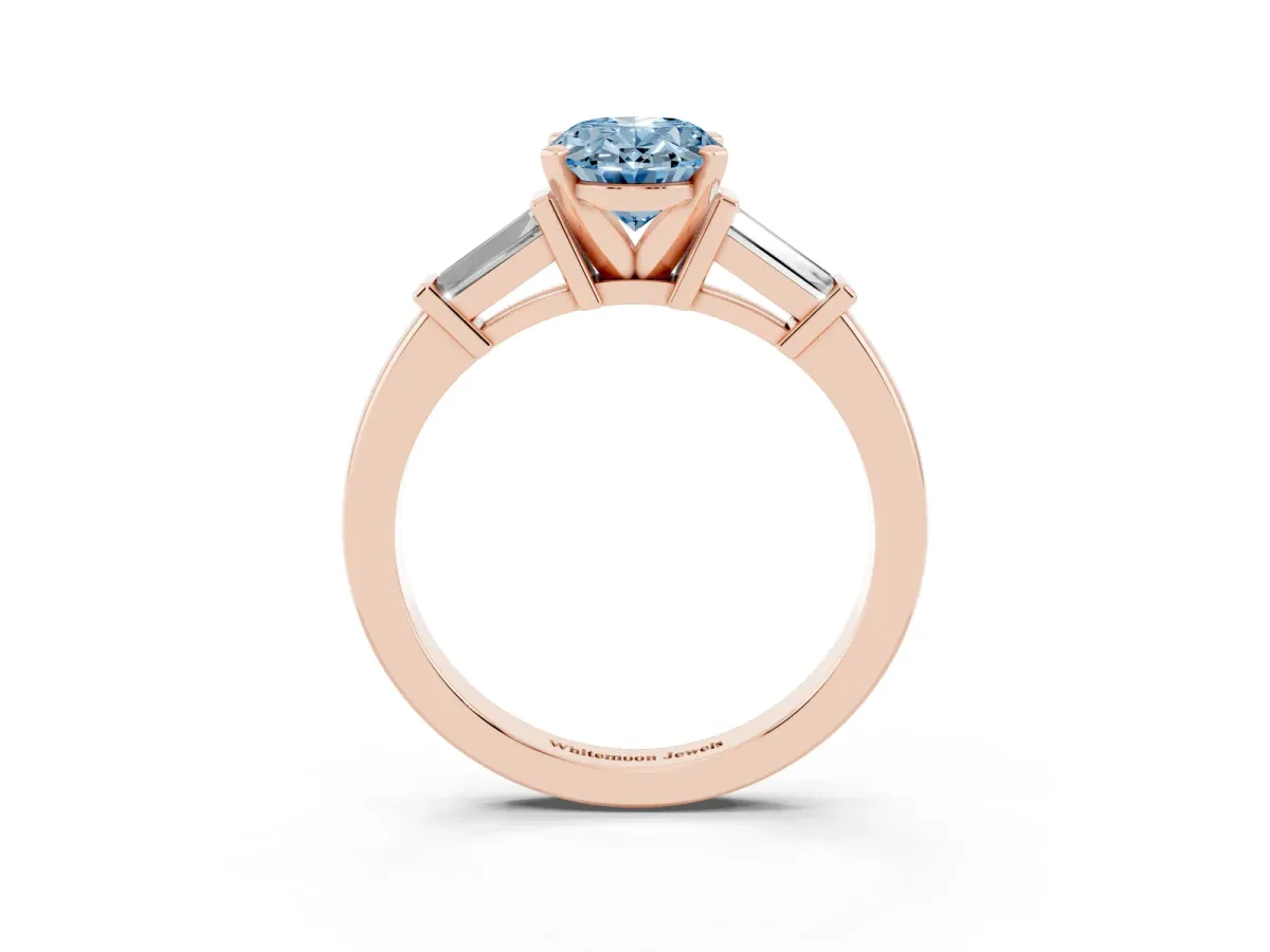 Fancy Blue Oval Cut Cut Diamond Solitaire Ring with Tapered Baguette Accents and Four-Prong Setting Rose gold