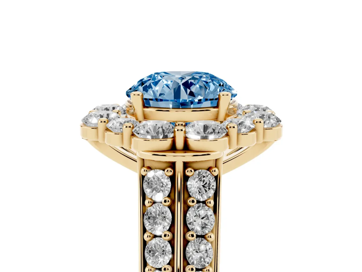 Fancy Blue Round Cut Halo Diamond Engagement Ring with Split Shank and Prong Setting Yellow gold