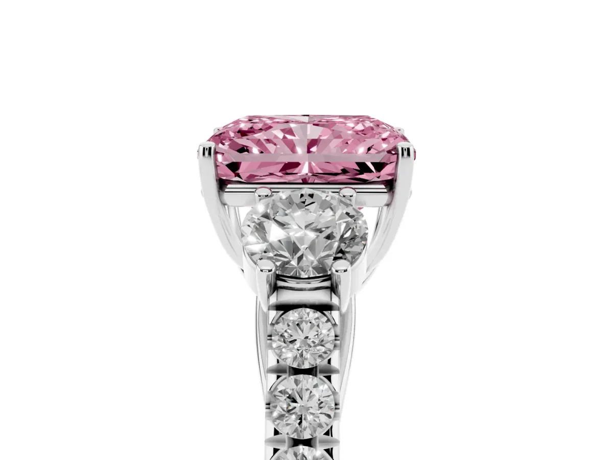 Fancy Pink Radiant Cut Cut Diamond Three-Stone Ring with Round Side Stones and Pavé Band Silver