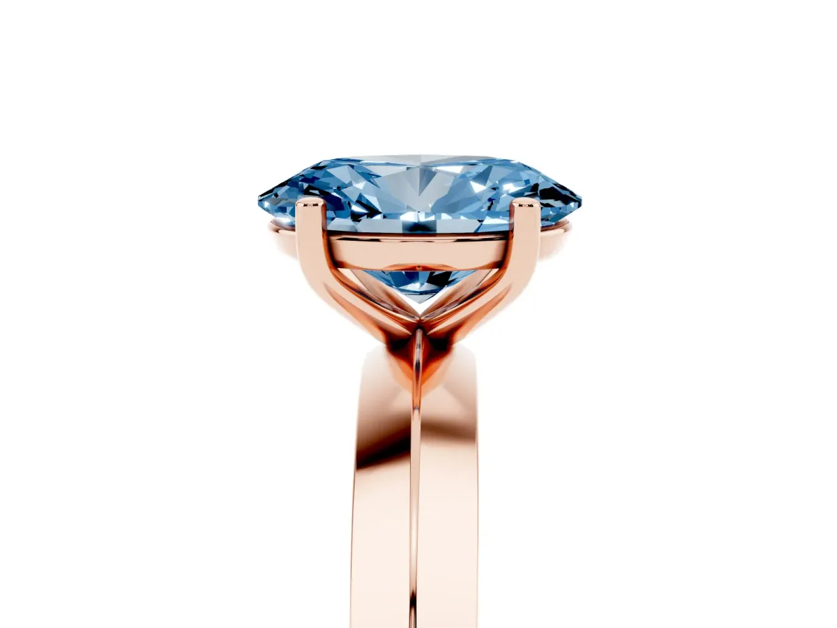 Fancy Blue Oval Cut Cut Solitaire Engagement Ring with Flat Band and Four-Prong Setting Rose gold