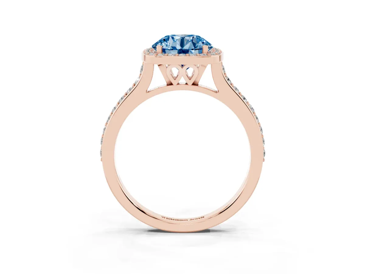 Fancy Blue Round Cut Diamond Halo Engagement Ring with Round Pavé Shoulders and Prong Setting Rose gold