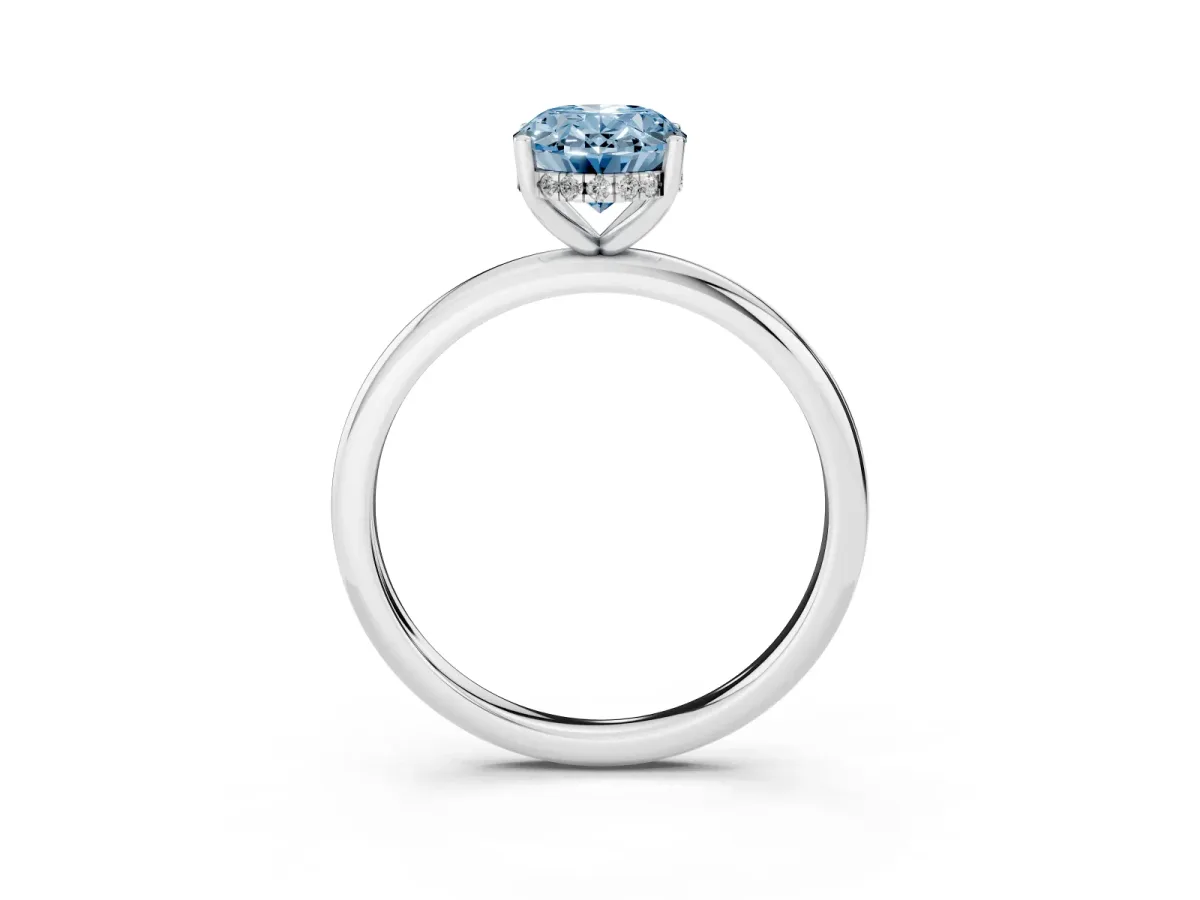 Fancy Blue Oval Cut Cut Solitaire Engagement Ring with Four-Prong Setting and Classic Band Silver