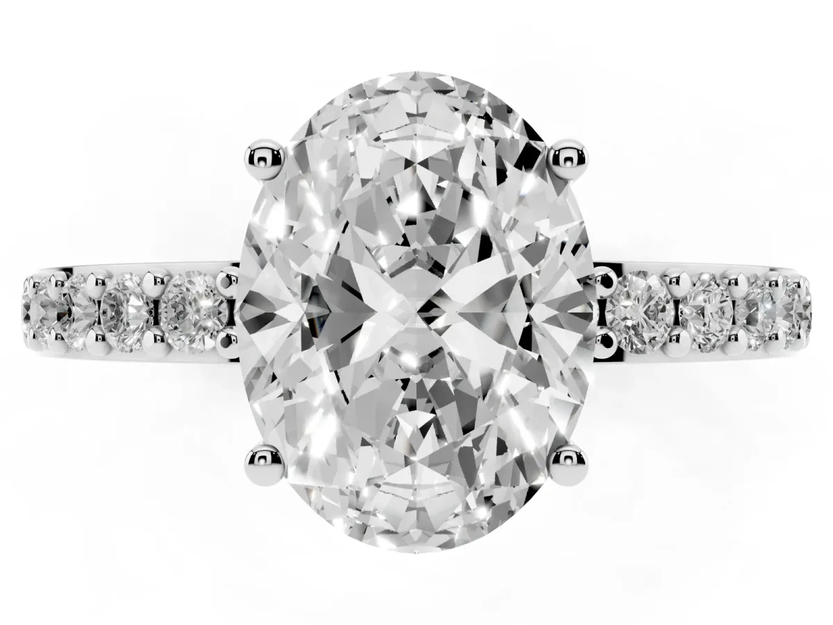Oval Cut Cut Diamond Solitaire with Pave Band and Four-Prong Setting Silver