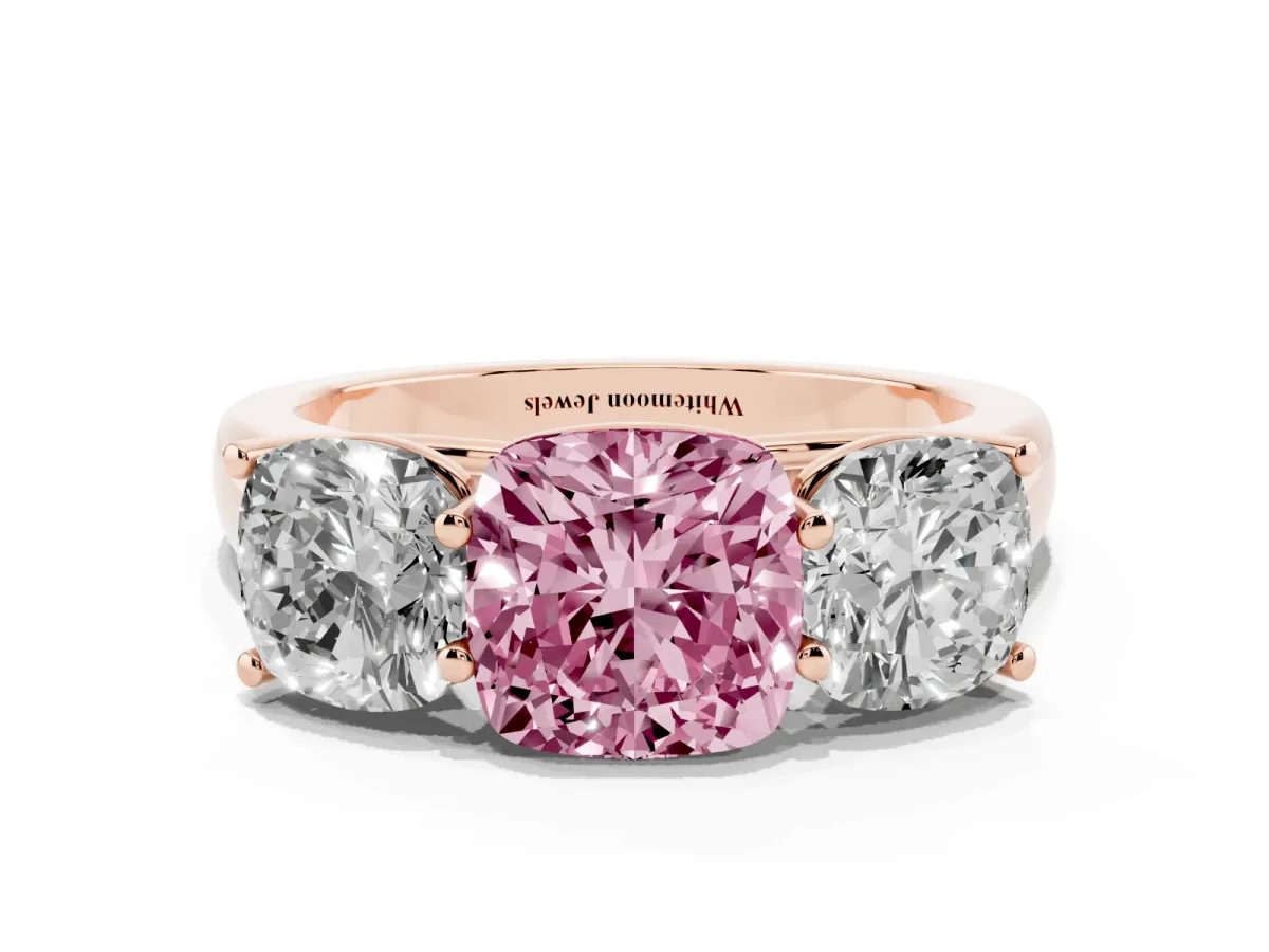 Fancy Pink Cushion Cut Three-Stone Diamond Ring with Prong Setting on a Classic Band Rose gold