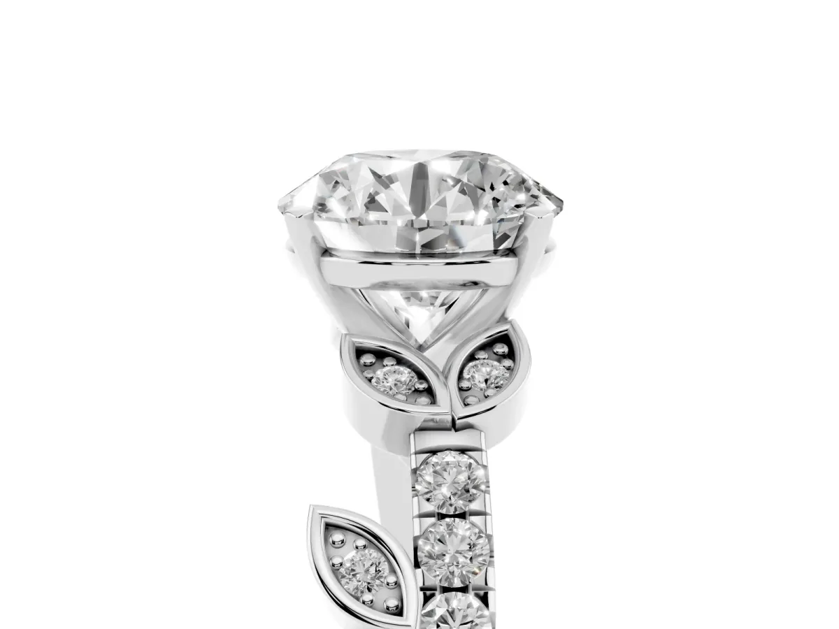 Round Cut Solitaire Leaf-Inspired Diamond Ring with Pavé Band and Four-Prong Setting Silver