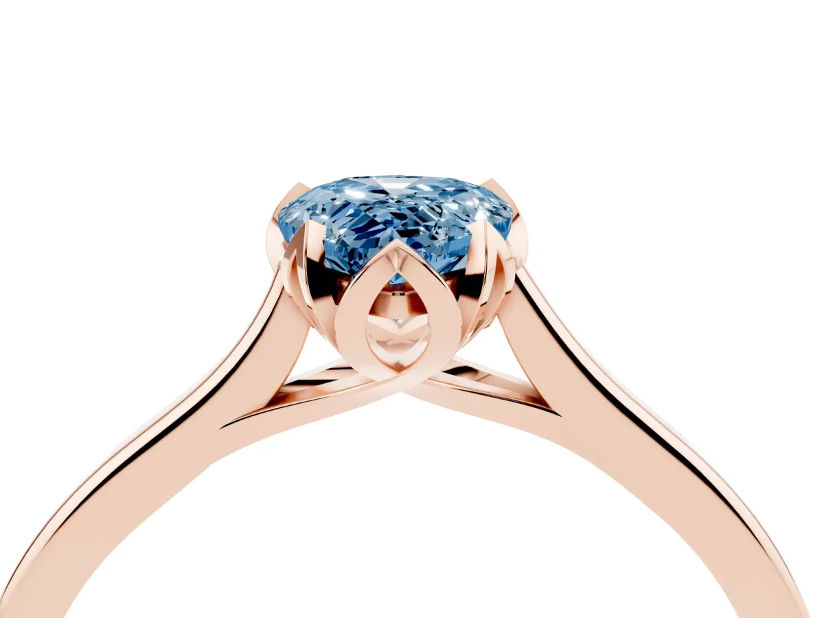 Fancy Blue Pear Cut Diamond Solitaire Ring with Flower Prong Setting and Classic Band Rose gold