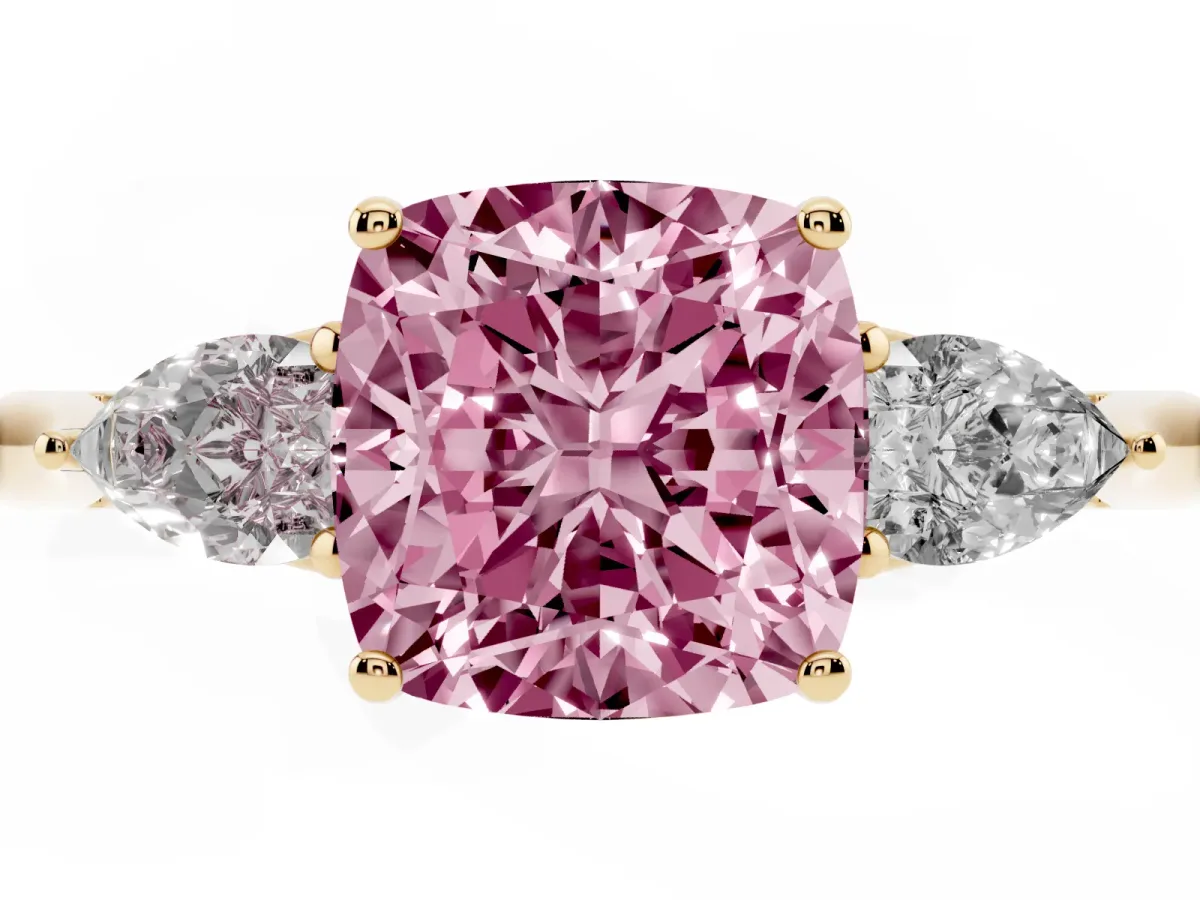 Fancy Pink Three-Stone Cushion Cut Brilliant Diamond Solitaire Ring with Tapered Band and Four-Prong Setting Yellow gold