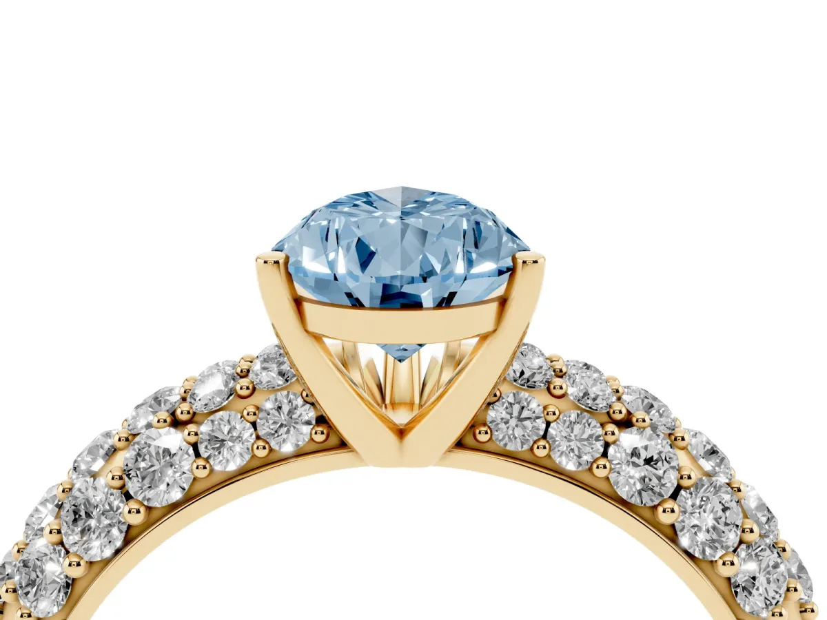 Fancy Blue Pear Cut Diamond Pavé Band Solitaire Ring with Four-Prong Setting Yellow gold